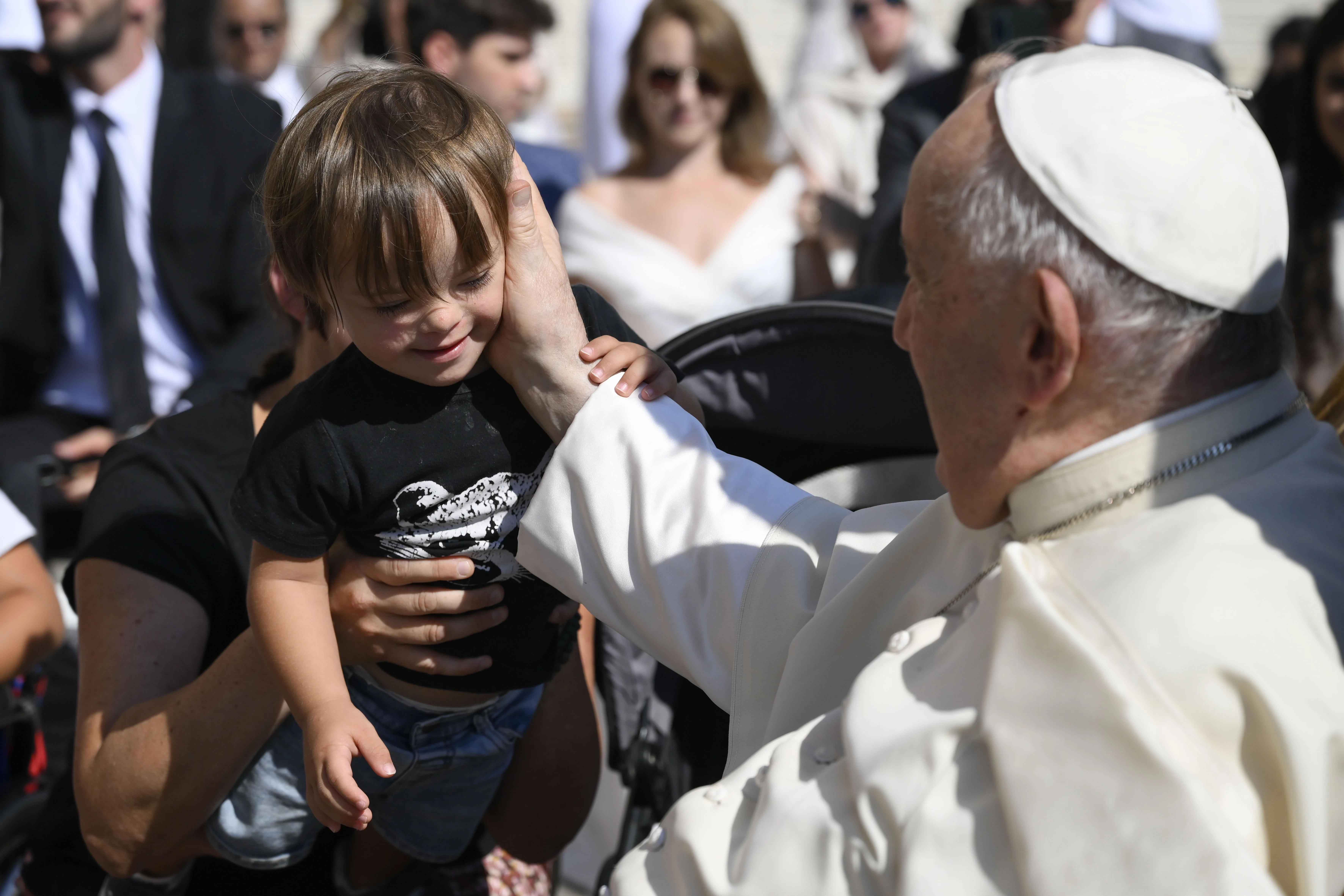 Pope Francis greets a little boy during his general audience in St. Peter's Square on Sept. 6, 2023. Vatican Media