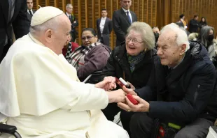 Pope Francis greets an elderly couple at his general audience on Jan. 11, 2023 Vatican Media