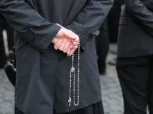 Seminarians from the North American College in Rome, Italy pray the rosary in St. Peter's Square for Pope Francis on March 13, 2016.