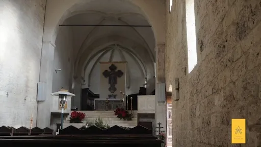 A pre-October 2016 photo of the Abbey of Sant’Eutizio showing where the cross used to hang above the altar. Credit: Vatican Museums