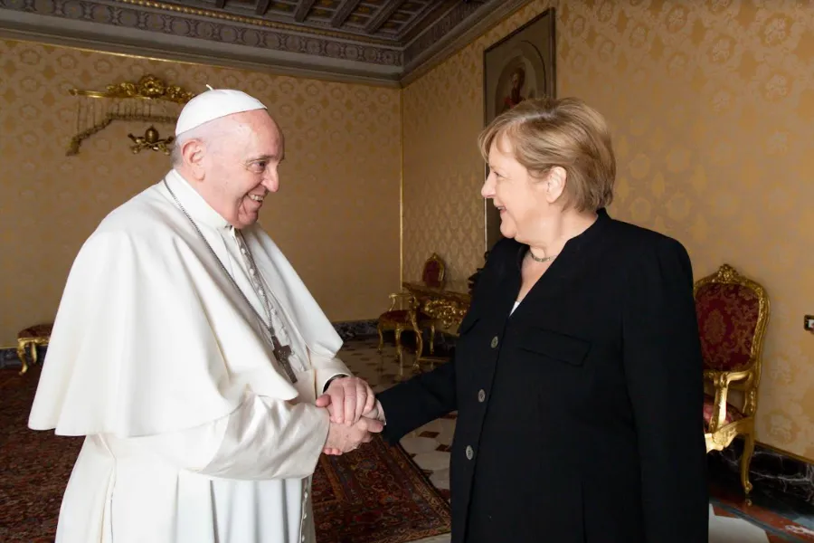 Pope Francis greets Angela Merkel, the outgoing Chancellor of Germany, at the Vatican, Oct. 7, 2021. Vatican Media.