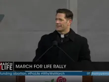 Father Mike Schmitz, the host of the "Bible in a Year" podcast, addresses the crowd at the March for Life rally on the National Mall in Washington, D.C., on Jan. 21, 2022.