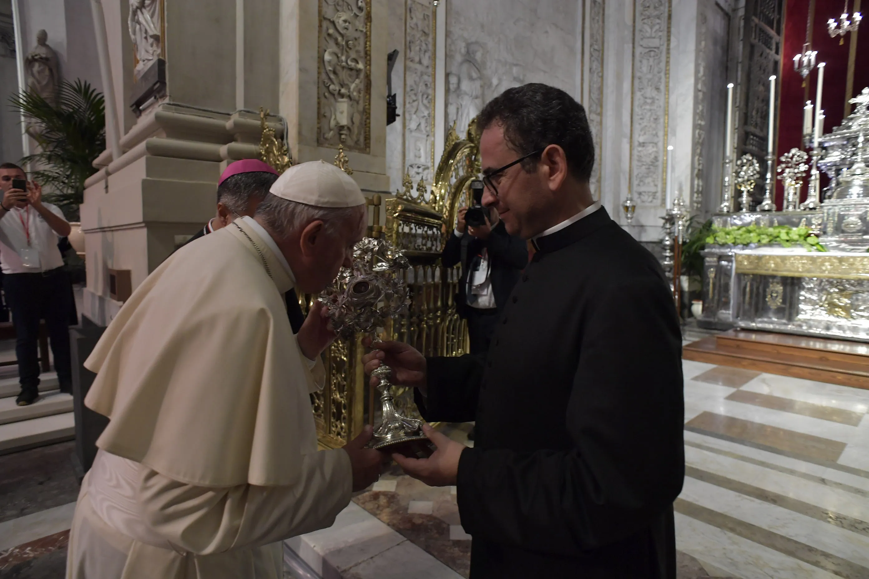 Pope Francis venerates a relic of Blessed Giuseppe "Don Pino" Puglisi in the Cathedral of Palermo, during a one-day visit to the Archdiocese of Palermo on the Italian island region of Sicily on Sept. 15, 2018. Vatican Media.