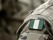 The flag of Nigeria on a military uniform.