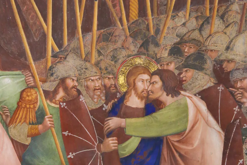 Judas betrays Jesus with a kiss, 14th-century fresco in the Collegiata of San Gimignano, Italy.?w=200&h=150