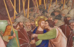 Judas betrays Jesus with a kiss, 14th-century fresco in the Collegiata of San Gimignano, Italy. Credit: jorisvo/Shutterstock