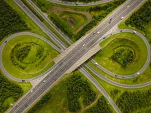 An aerial view of the M7 motorway and N18 national road junction on the outskirts of Limerick, Ireland.