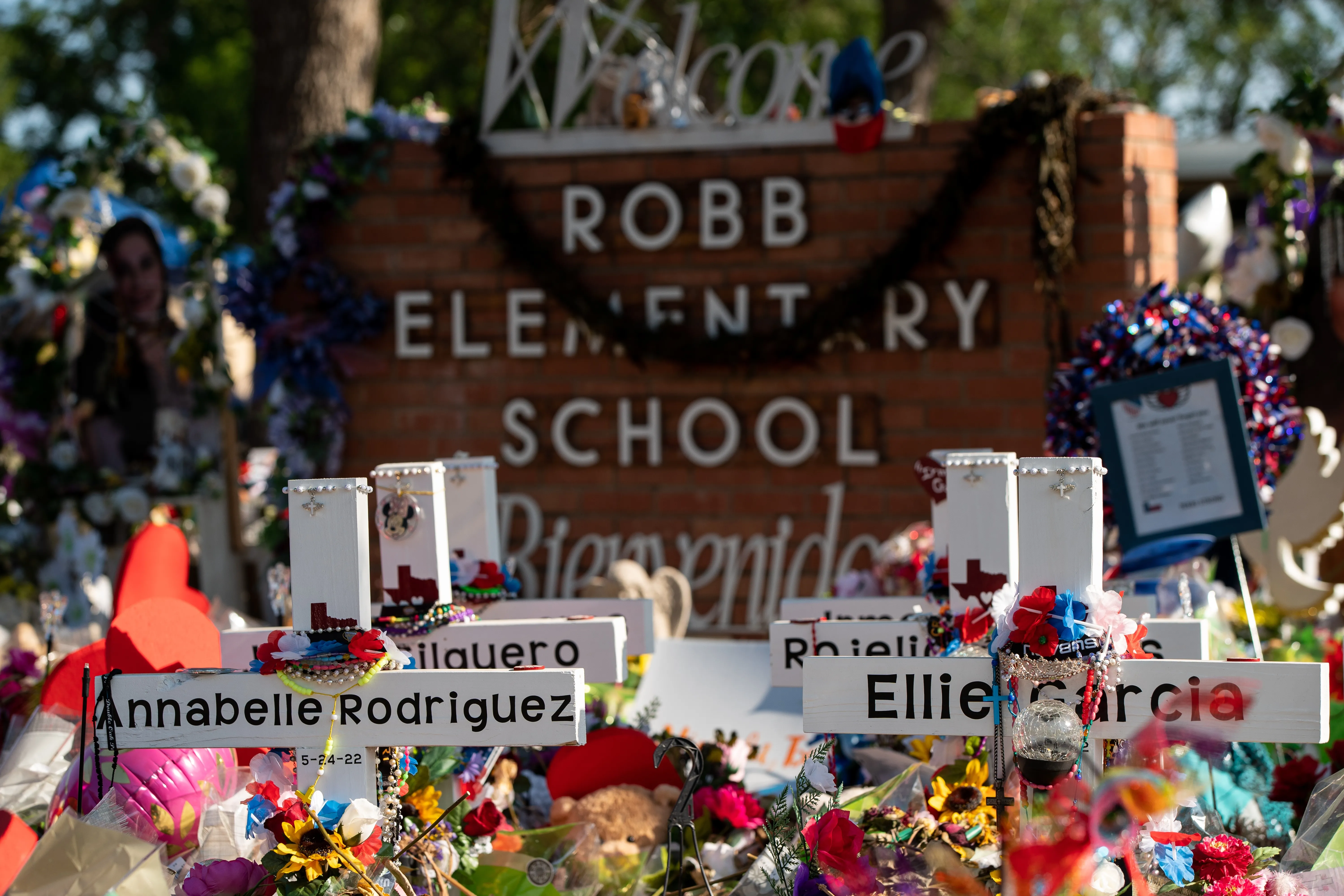 Texans on June 5, 2022, visit the memorial at Robb Elementary School dedicated to the victims of the May shooting in Uvalde, Texas.?w=200&h=150