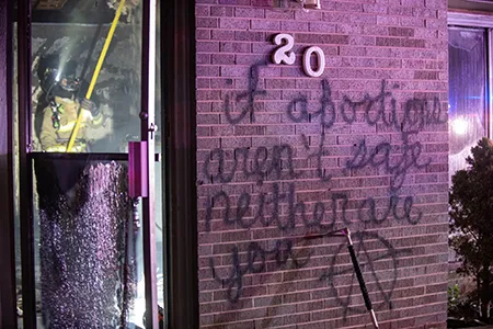 Spray-painted graffiti outside Life Choices, a pro-life pregnancy center in Longmont, Colorado.