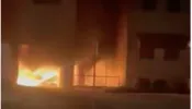 Fire rips through a building containing the cafeteria and gymnasium of St. Anthony of Padua School in Lorain, Ohio, on June 30, 2022. An arson investigation is underway.