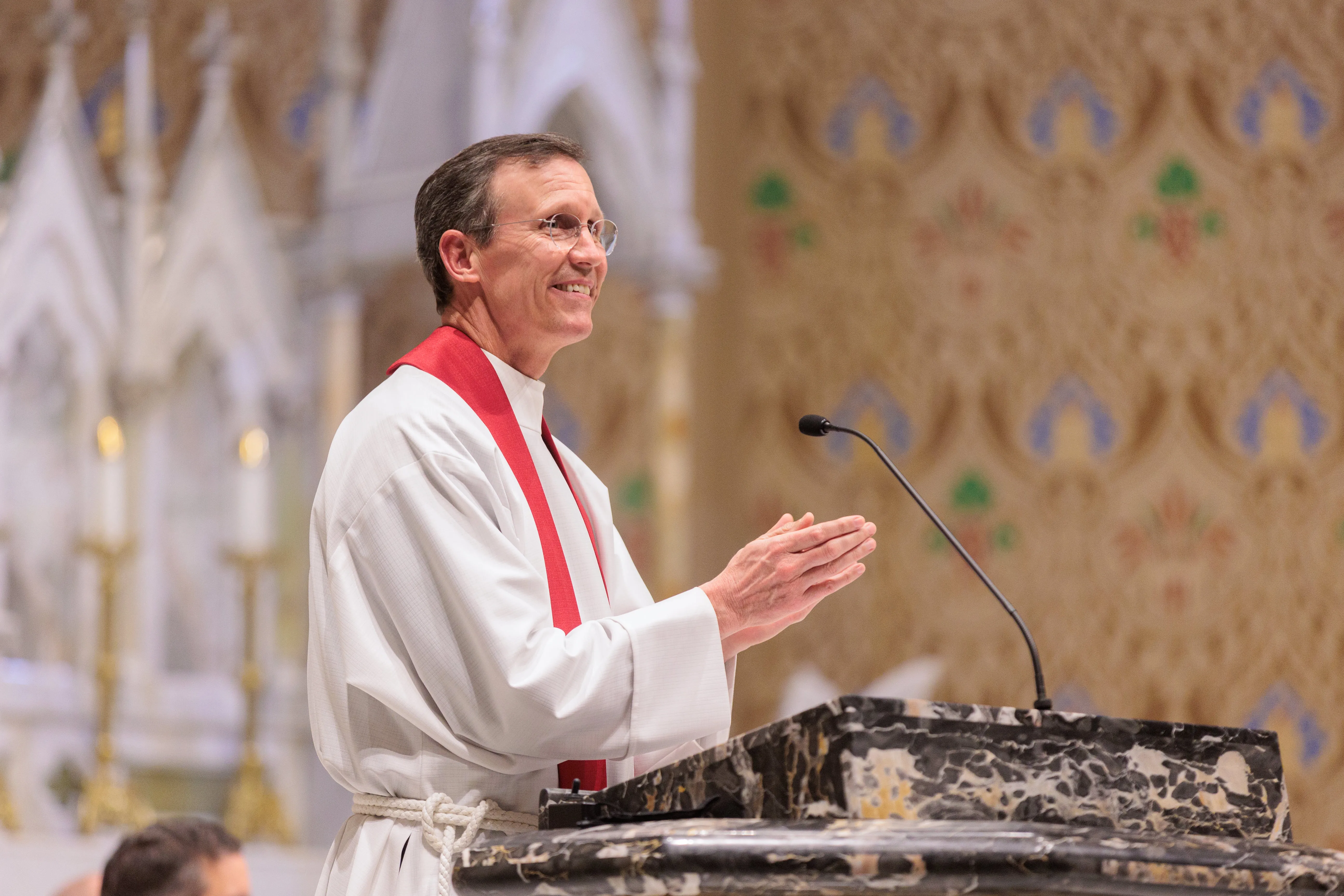 The rector of the new basilica, Father Kevin Segerblom, at the lectern. Credit: Ryan Hunt/Catholic Diocese of Richmond