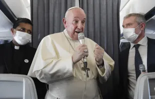 Pope Francis speaks during an in-flight press conference on the journey from Athens to Rome, Dec. 6, 2021. Vatican Media.