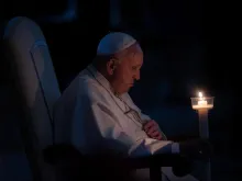 Pope Francis prays at the Easter Vigil Mass in St. Peter's Basilica on April 16, 2022.