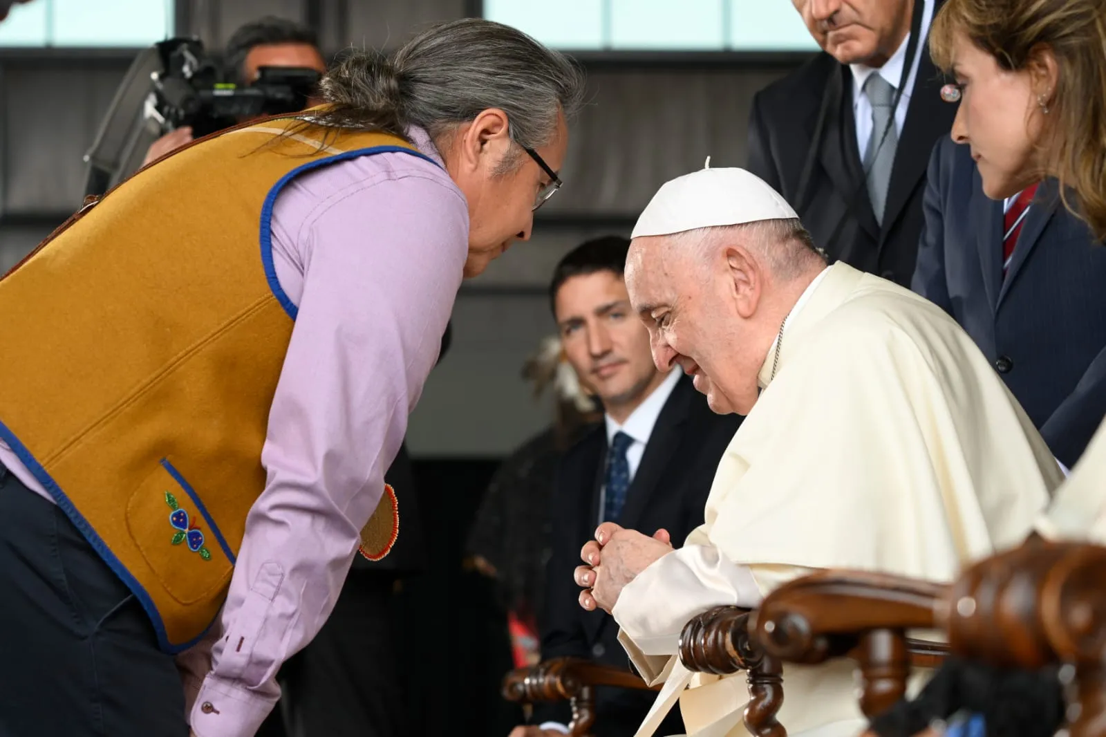 Pope Francis meets representatives of Canada's indigenous peoples in the hangar of the airport in Edmonton on July 24, 2022, as Canadian Prime Minister Justin Trudeau (center) and other look on. Vatican Media