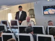 Pope Francis speaks with members of the press on the flight from Bahrain to Rome.