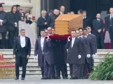 The coffin of Pope Emeritus Benedict XVI is carried into St. Peter's Square prior to his funeral Mass on Jan. 5, 2023.