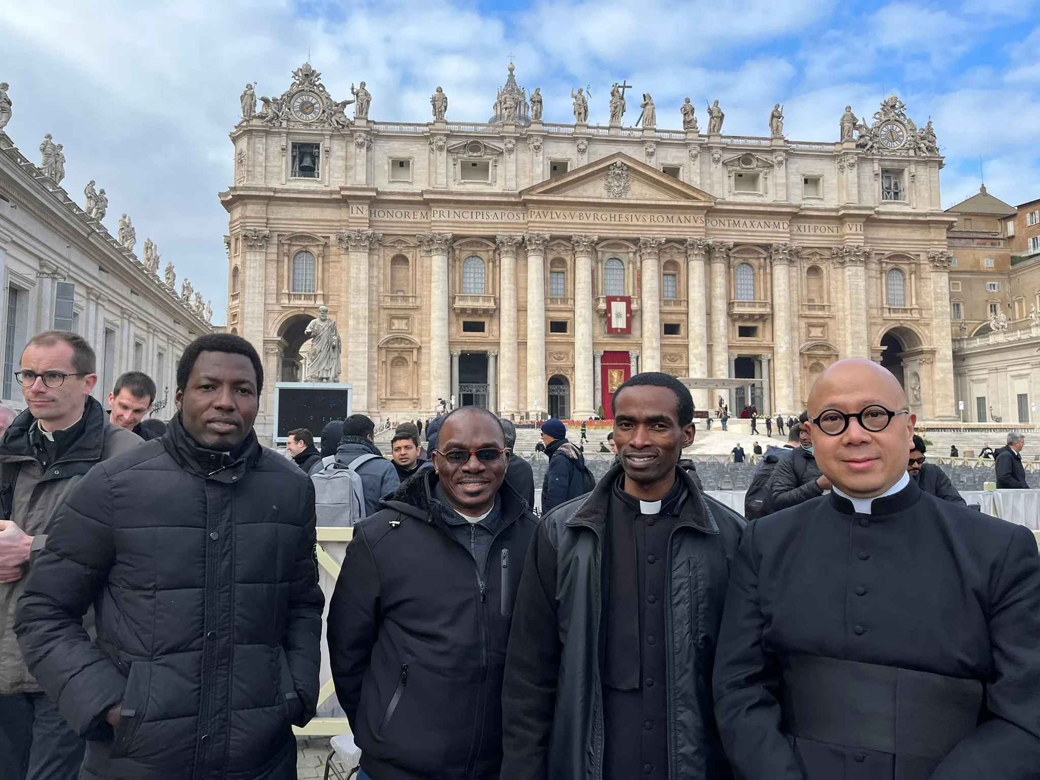 Father Albert Musinguzi (second from right) with other priests and deacons at the funeral of Pope Benedict XVI on Jan. 5, 2023, in St. Peter's Square at the Vatican. Courtney Mares / CNA