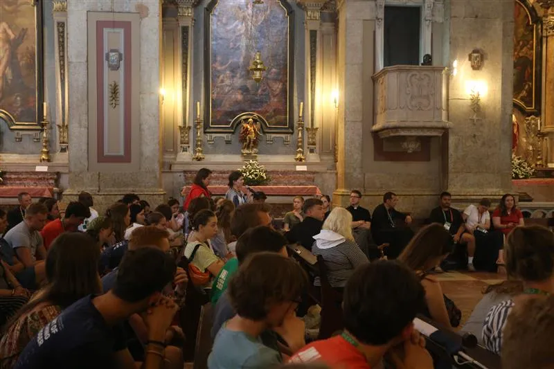 Young people from the Netherlands, Poland, the Philippines, Ireland, Australia, the United States, and Liberia participated in a Rise Up Encounter with Archbishop Charles Thompson of Indianapolis in the Church of Our Lady of Providence in Lisbon, Portugal, on Aug. 2, 2023. The morning included praise and worship, a catechesis, a question and answer session, and Mass. Credit: Hannah Brockhaus/CNA